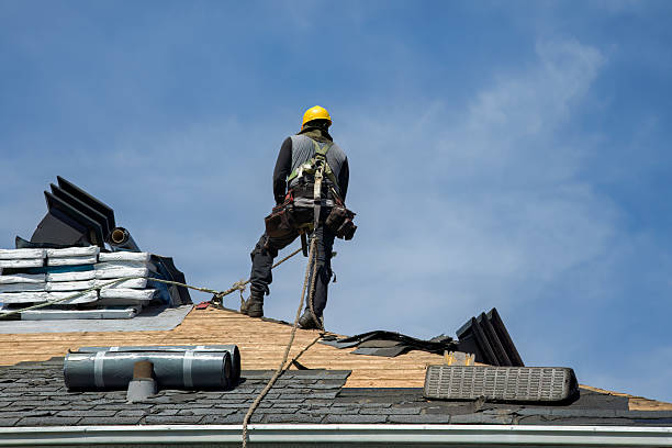 Professional Roof Replacement technician working in Mankato, KS